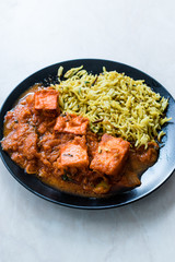 Indian Food Paneer Butter Tikka Masala / Cheese Cottage Curry and Jeera Zira Rice Basmati Pilaf or Pilav.