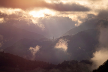 Misty sunset in the mountains