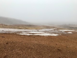 Haukadalur, the home to some of the most famous sights in Iceland: the geysers and other geothermal features which have developed on the Laugarfjall rhyolitic dome.