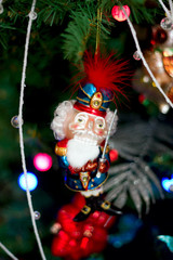 Beautiful christmas tree toys on the brunch of the tree