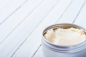 shea butter on white wooden