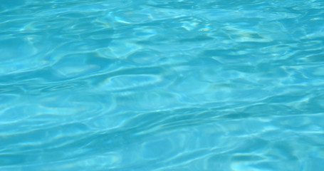 Fototapeta na wymiar Swimming pool water wave in blue color