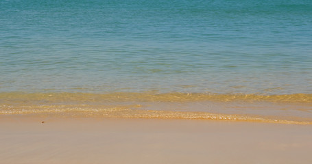 Fototapeta na wymiar Sea sand beach and blue sky