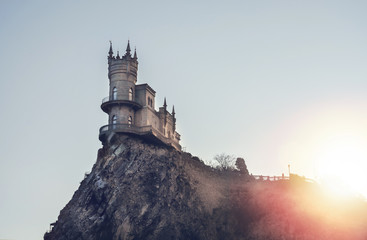 Fototapeta Swallow's Nest castle on the rock over the Black Sea on the sunset. Yalta. obraz