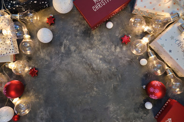 Christmas lights decoration background over linen background. Horizontal photo taken from above, top view with copy space for text and other web or print design elements.