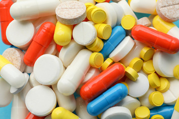 Different pills on whole background, close up. Health care