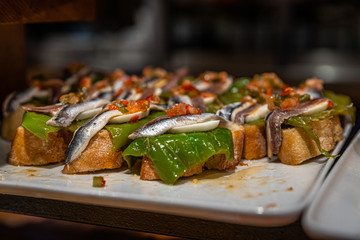 Pinchos with bell pepper and anchovy