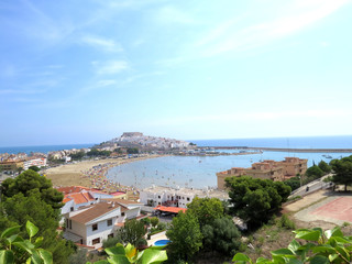Beautiful, summer, sunny view of the city of Peniscola, the beach and castle of the Knights...