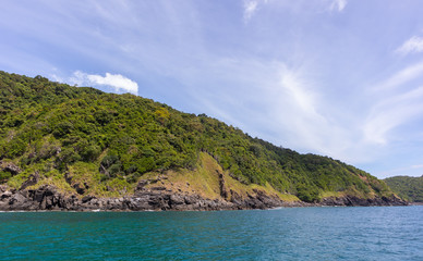 mountain stone coast and sea view in yacht cruise at Phuket, Thailand