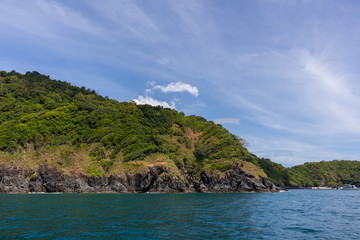 Obraz na płótnie Canvas mountain stone coast and sea view in yacht cruise at Phuket, Thailand