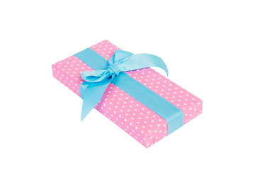 Fototapeta premium Christmas or other holiday handmade present in pink paper with blue ribbon. Isolated on white background, top view. thanksgiving Gift box concept