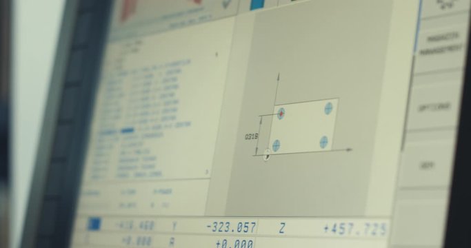 The display of control milling machine, on which going the program of manufacturing detail. Changing the program code, Close-up