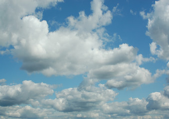white clouds in a blue sky