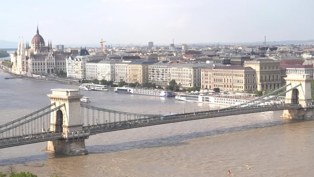 pan left of chain bridge and the hungarian parliament from buda castle in budapest, hungary