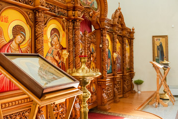 Interior of the Russian Orthodox Slavic Christian Church. Traditional candle holders, altar.