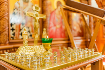 Interior of the Russian Orthodox Slavic Christian Church. Traditional candle holders, altar.