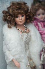 Closeup of vintage doll at flea market in the street