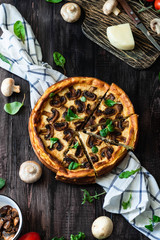 Jellied pie with meat and mushrooms on potato dough