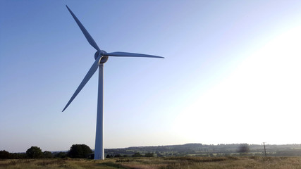 wind farm turbine over country landscape in england uk