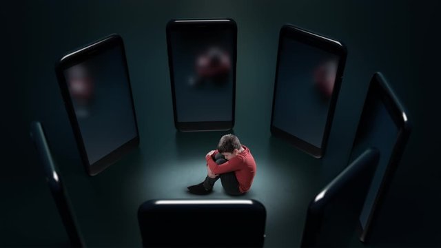 Young Boy Sitting and afraid a Big Formidable Phones. Cyber Bullying Concept. Outlaw, Outcast person. Bad dreams, nightmares, surrealistic world. Creative unique visual theme. Abusive messages.
