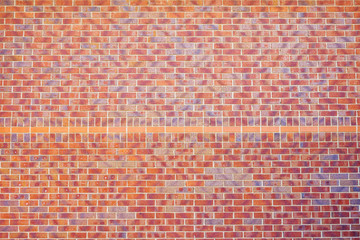 red brick wall texture on new build building in england uk