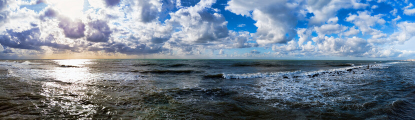 Dangerous weather 180 degrees panorama, a storm affects the Roman coasts, rain clouds and dramatic lights over a rough sea