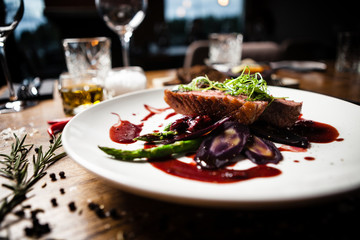 Duck breast served on a plate in restaurant
