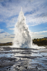 Iceland, September 27, 2019,Icelandic Geyser Strokkur. Great tourist attraction on Golgen Circle Iceland. Vsible geyser valley