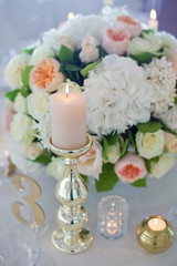 beautiful flowers compositions and candles
