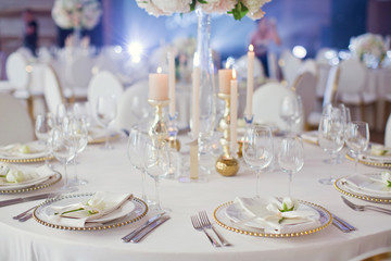 Beautiful table setting with white flowers