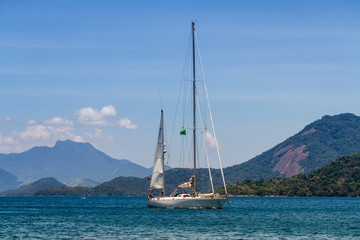 Fototapeta na wymiar Sailing Boat in Angra dos Reis bay area during the summer time