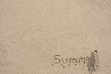 Summer Text message in sand on the beach