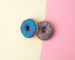 round baked donut with colored sugar sprinkles
