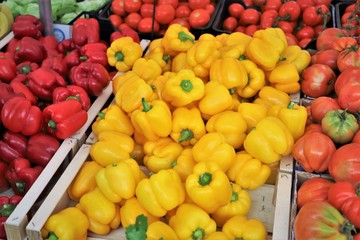 closeup of  peppers on display at the market