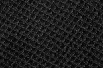 Black natural texture of knitted wool textile material background. dark  cotton fabric woven canvas texture