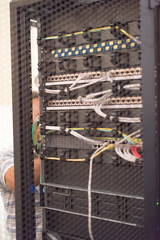 Rack Mounted Servers In A Server Room, close up