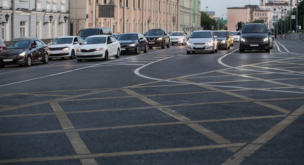Cars at the crossroads in the city