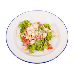 Dieting healthy salad with tomatoes, crackers and cheese isolated on white.
