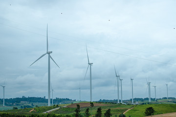 Silhouetted windmills at Khao Kho in the countryside