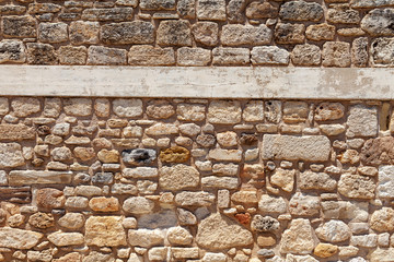 very old stone wall of stones, background