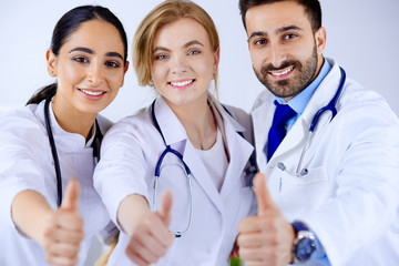 Fototapeta premium Medical team shows thumb up