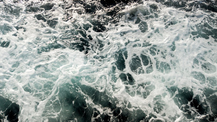 Fototapeta na wymiar waves closer shot from boat