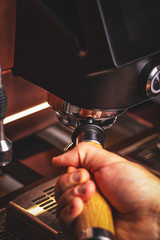 Barista prepares cappuccino