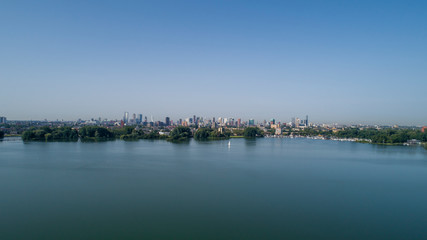 Fototapeta premium View on the skyline of Rotterdam as seen from the Kralingse Bos