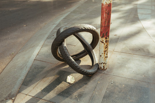 Bike tire on the street as sign of repair service