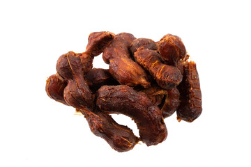 fresh tamarind fruits and leaves isolated on white