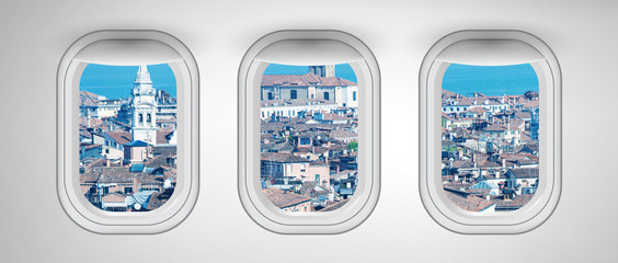 Beautiful scenic city view of Venice through the aircraft windows