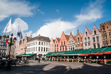 Naklejka premium Bruges, Belgium - May 2019: Main city square of old Bruges Belgium in sunny weather