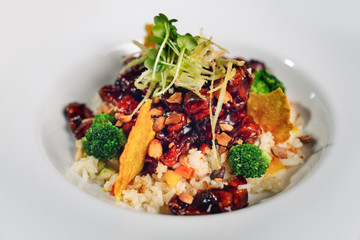 Salad in a plate on the boards.