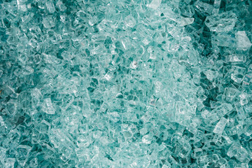 Pile of broken tempered glass texture and close-up
